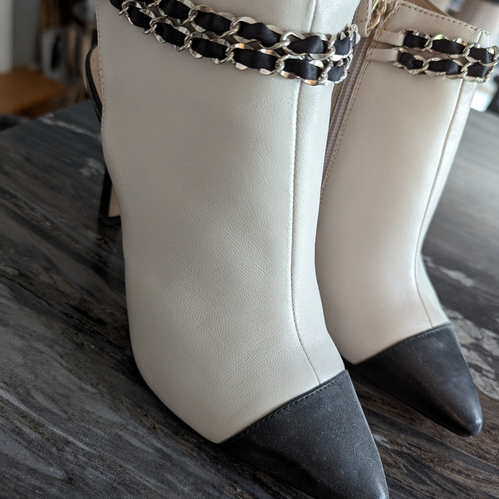 Ladies shoes with heels. Gold chain and two tone black and white